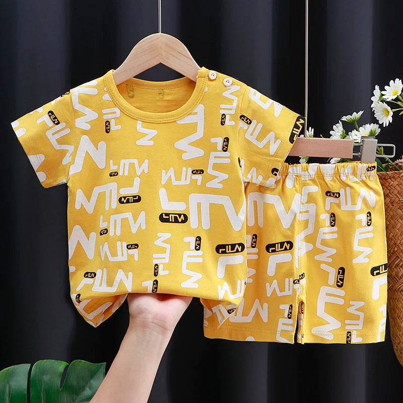 Conjunto de ropa para niños, camiseta y pantalones cortos para bebé niño/niña, ropa de verano de algodón con dibujos animados, chándal informal para niño y bebé.