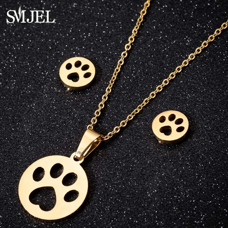 Hermoso conjunto de joyas de acero inoxidable con diseño de gatito y gato en color dorado para hombre, collar con pendientes de gato huecos a la moda, joyería con forma de pata.