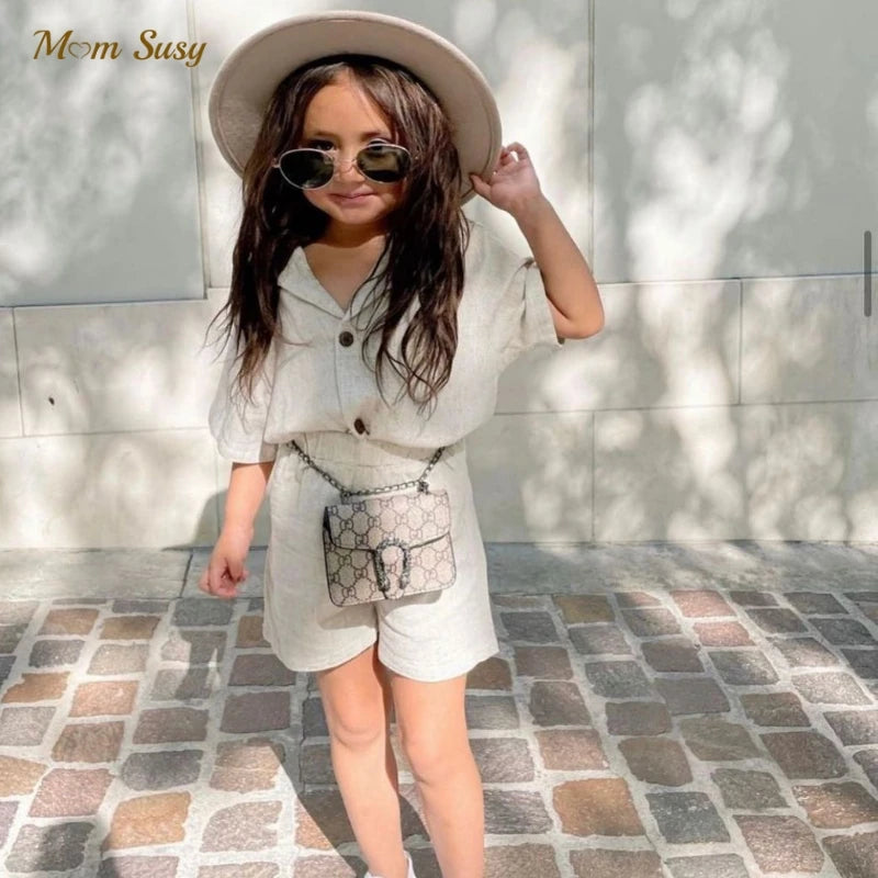 Conjuntos de ropa para bebé niño y niña, camisa y pantalón corto de lino de verano para bebé pequeño, mono con botones de manga corta, ropa para bebé de 1 a 7 años