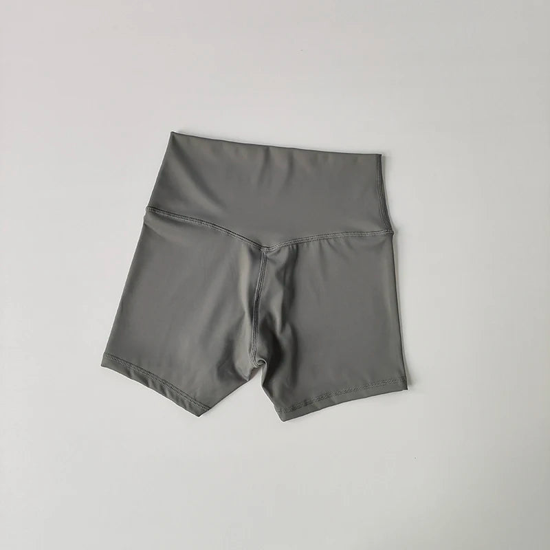 Pantalones cortos deportivos de yoga, ajustados, elásticos, de tres piezas, con cintura alta, realce de cadera y secado rápido.