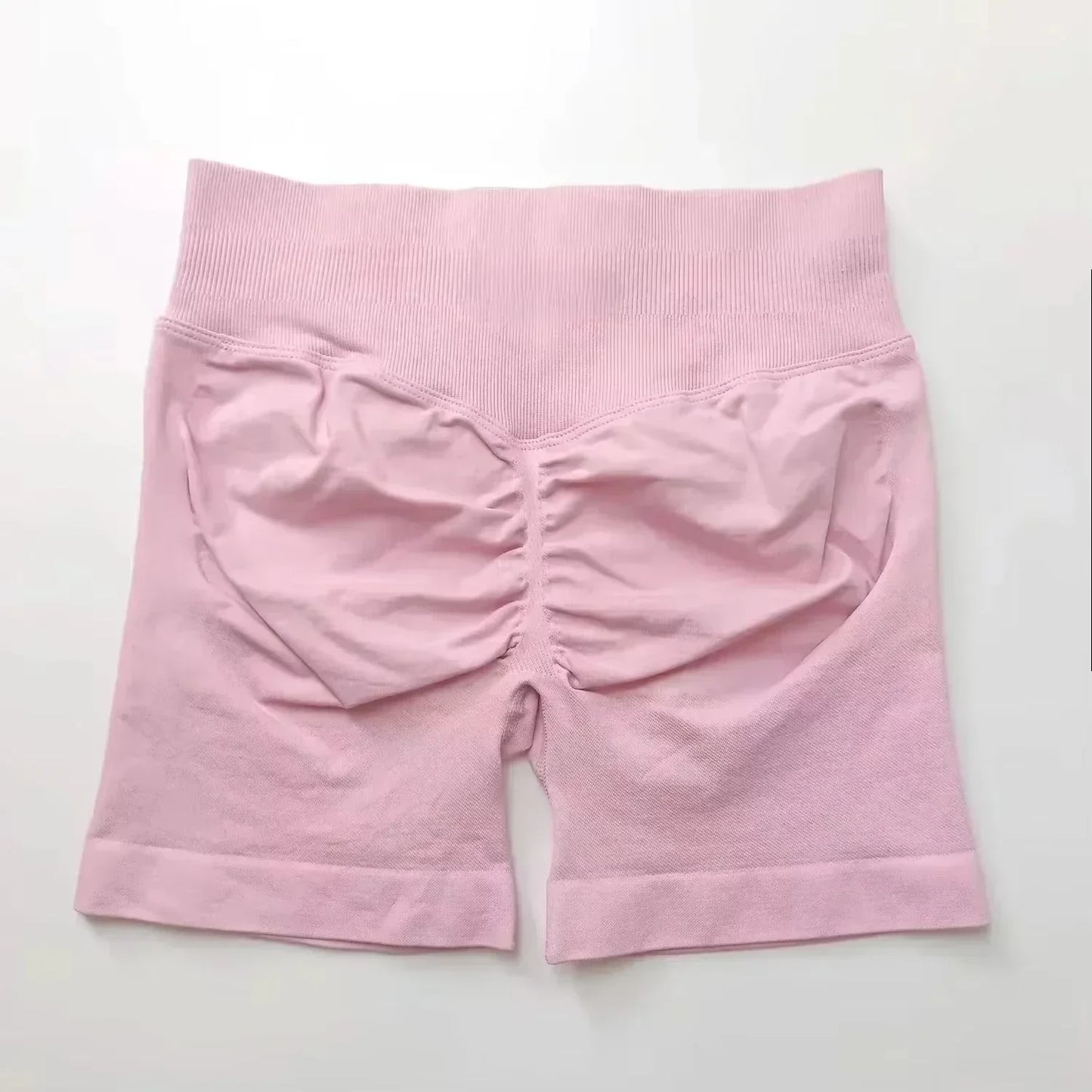 Pantalones cortos deportivos de yoga para mujer, de verano, con efecto piel de melocotón, con bolsillo en la cadera, cintura alta, levantamiento de cadera, secado rápido.