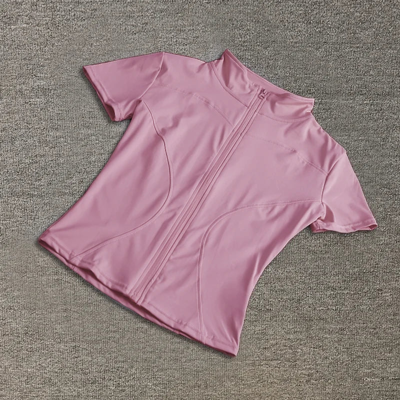 Camisetas de entrenamiento adelgazantes de cintura de verano de alta calidad para mujer, de secado rápido, con cuello alto ajustado y cremallera completa, camisetas de yoga de manga corta.