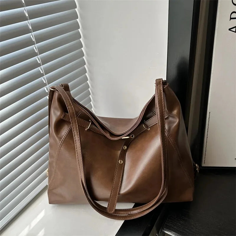 Bolso de mano retro de gran capacidad para mujer, mochila informal de moda con doble hombro para otoño e invierno, nuevo bolso de moda.