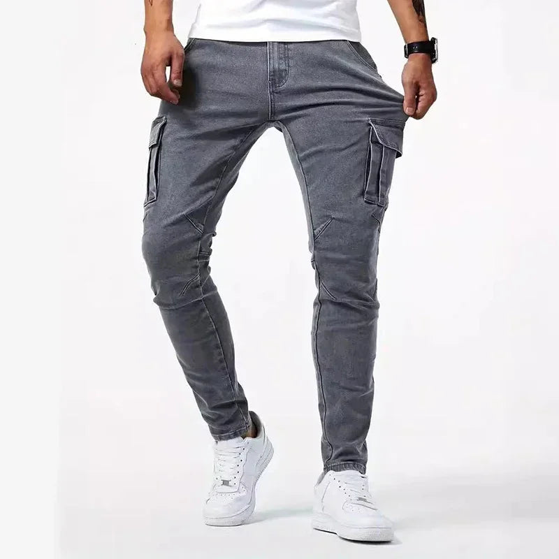 Pantalones vaqueros casuales de hombre, estilo lápiz, elásticos, con múltiples bolsillos, corte ajustado, estilo urbano, lavado liso, cintura media, estilo cargo.