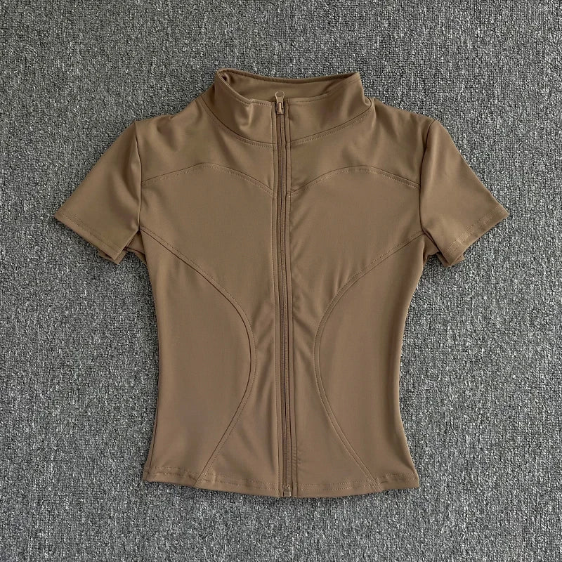 Camisetas de entrenamiento adelgazantes de cintura de verano de alta calidad para mujer, de secado rápido, con cuello alto ajustado y cremallera completa, camisetas de yoga de manga corta.