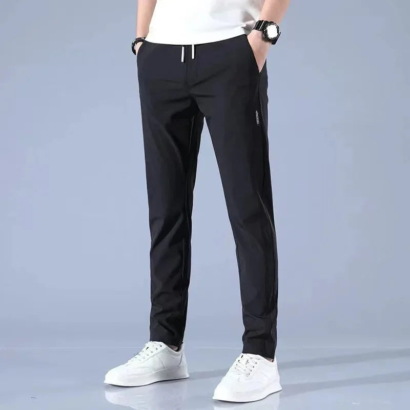 Pantalones deportivos largos de seda de hielo para hombre, de verano, nuevos, finos, informales, de negocios, elásticos, transpirables, de pierna recta, de talla grande