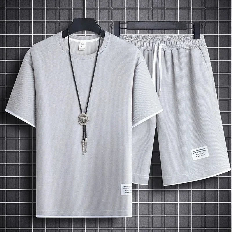 Conjunto deportivo informal de verano para hombre, pantalones cortos de manga corta con cordón, pantalones holgados de cinco cuartos, traje fino de dos piezas para hombre