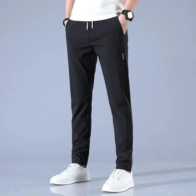 Pantalones deportivos largos de seda de hielo para hombre, de verano, nuevos, finos, informales, de negocios, elásticos, transpirables, de pierna recta, de talla grande
