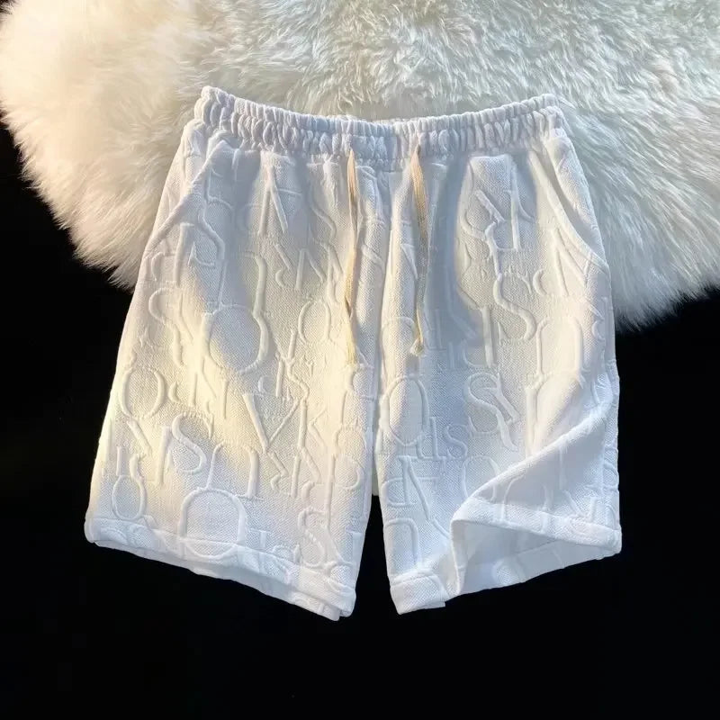 Pantalones cortos holgados de cinco puntos para hombre, estilo americano, estilo retro, de baloncesto, informales, de verano, con diseño de nicho y sensación de ocio.