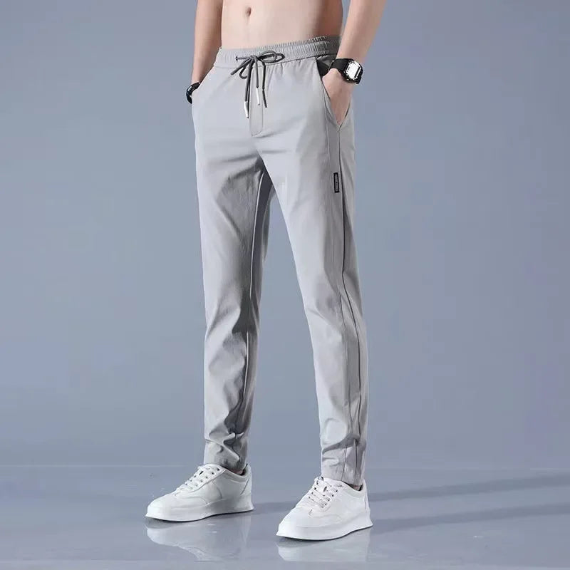 Pantalones deportivos largos de seda de hielo para hombre, de verano, nuevos, finos, informales, de negocios, elásticos, transpirables, de pierna recta, de talla grande