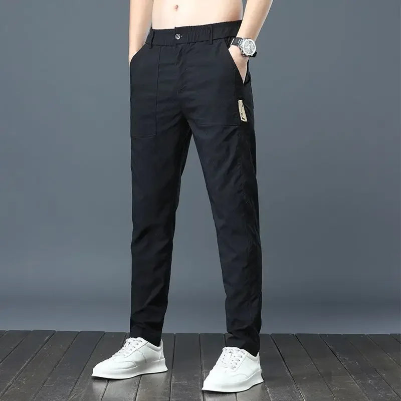 Pantalones casuales finos de verano para hombre, transpirables, de seda de hielo, elásticos, de pierna recta, holgados, de secado rápido, modernos y versátiles, largos