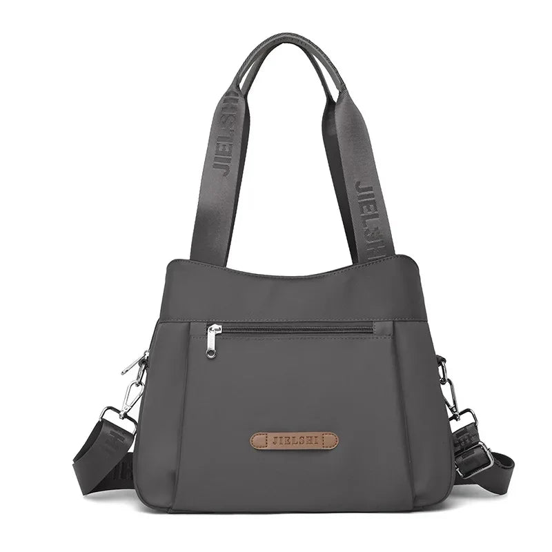 Bolso bandolera de nailon impermeable de moda, bolso informal para ir de compras o de viaje, bolso de mano Jietrans de nuevo estilo, bolso de un solo hombro.
