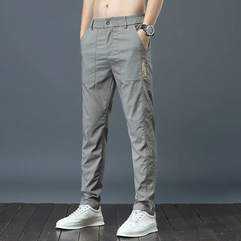Pantalones casuales finos de verano para hombre, transpirables, de seda de hielo, elásticos, de pierna recta, holgados, de secado rápido, modernos y versátiles, largos