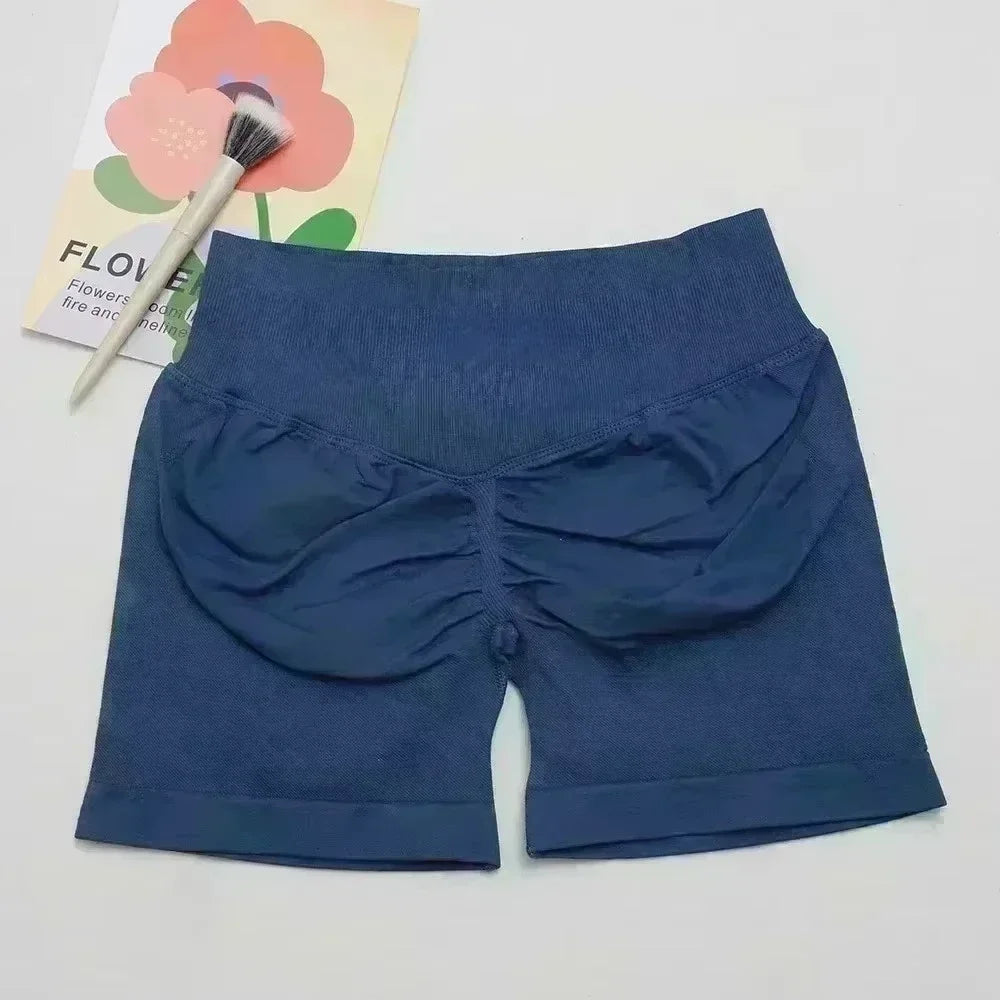 Pantalones cortos deportivos de yoga para mujer, de verano, con efecto piel de melocotón, con bolsillo en la cadera, cintura alta, levantamiento de cadera, secado rápido.