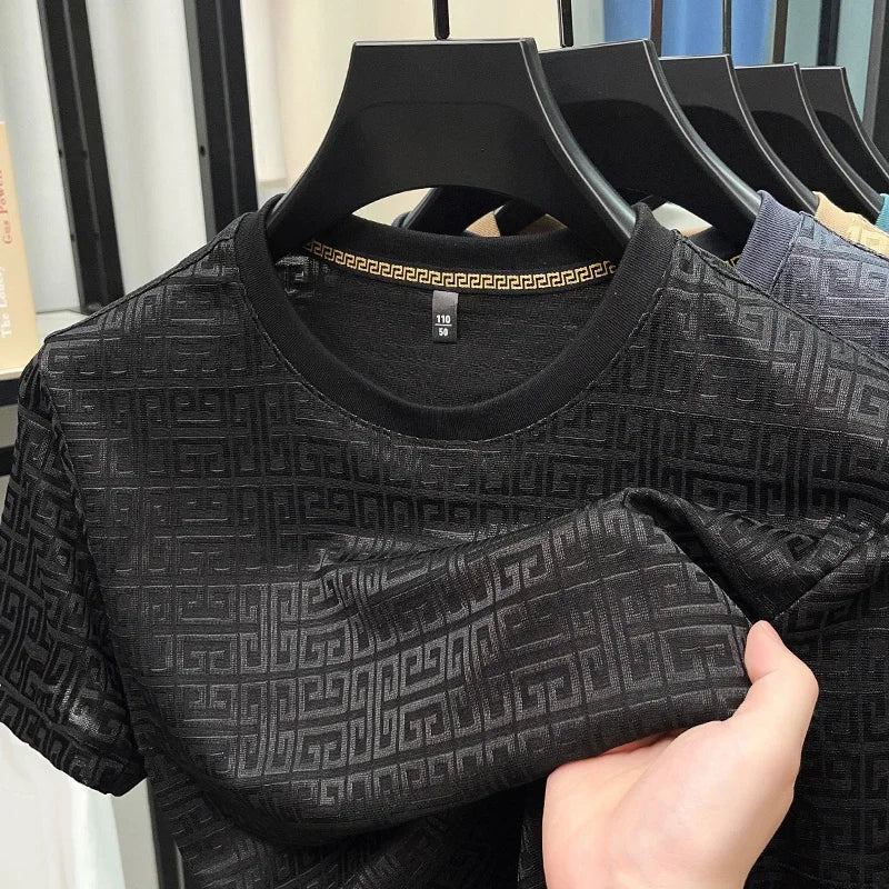 Camiseta de cuello redondo y manga corta de jacquard de moda para hombre, nueva, informal, cómoda y versátil para todas las estaciones, 2025