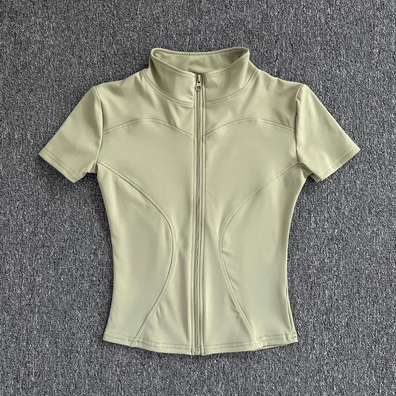 Camisetas de entrenamiento adelgazantes de cintura de verano de alta calidad para mujer, de secado rápido, con cuello alto ajustado y cremallera completa, camisetas de yoga de manga corta.