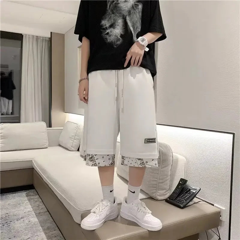Pantalones cortos de estilo americano con cintura elástica para hombre, marca de moda, estilo hip hop, ropa de calle, holgados, de dos piezas, estilo casual de verano.