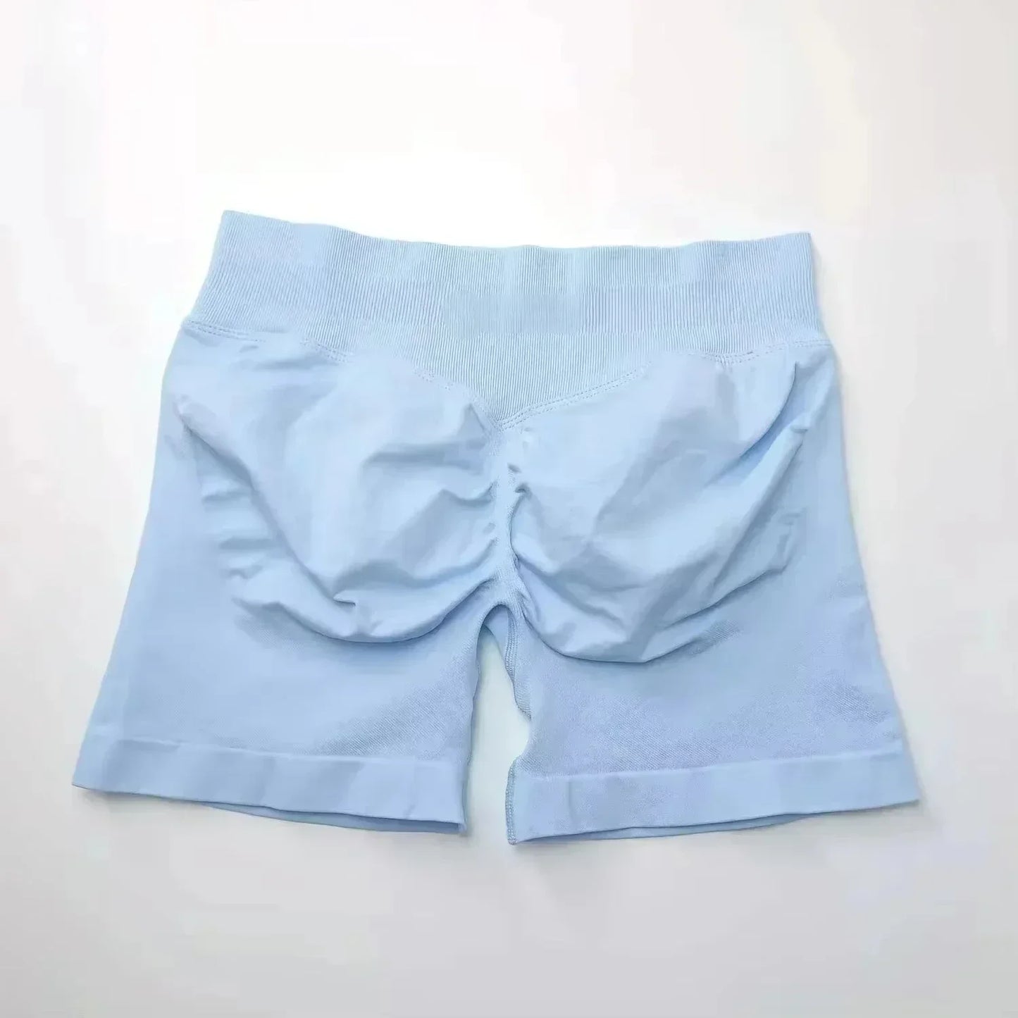 Pantalones cortos deportivos de yoga para mujer, de verano, con efecto piel de melocotón, con bolsillo en la cadera, cintura alta, levantamiento de cadera, secado rápido.