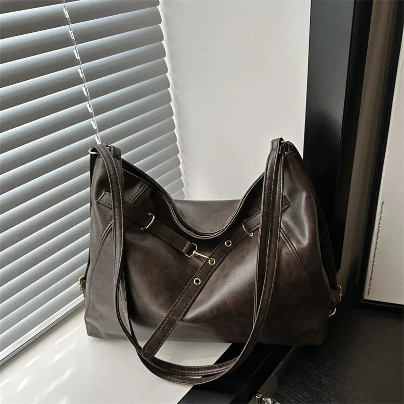 Bolso de mano retro de gran capacidad para mujer, mochila informal de moda con doble hombro para otoño e invierno, nuevo bolso de moda.