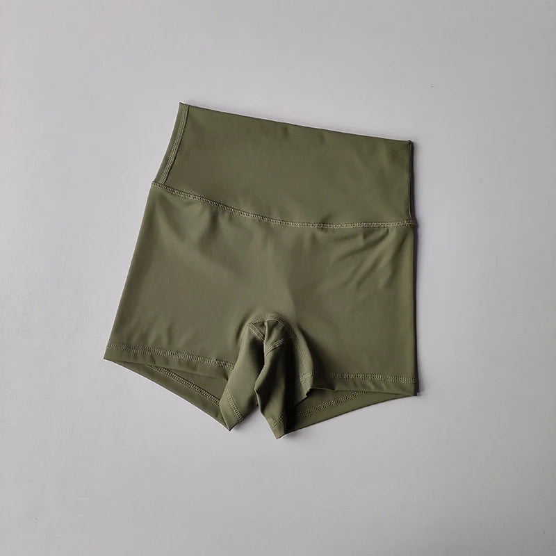 Pantalones cortos deportivos de yoga, ajustados, elásticos, de tres piezas, con cintura alta, realce de cadera y secado rápido.