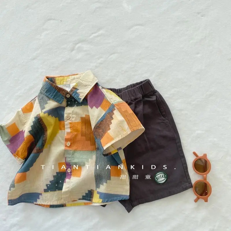 Ropa para niños 2025, nuevo traje de flores de moda para bebé, camisa de manga corta, pantalones cortos, elegante conjunto de dos piezas de pantalones cortos casuales retro.