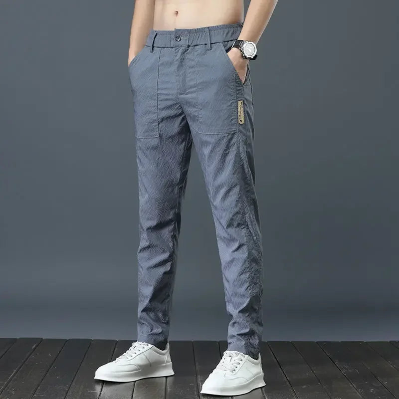 Pantalones casuales finos de verano para hombre, transpirables, de seda de hielo, elásticos, de pierna recta, holgados, de secado rápido, modernos y versátiles, largos