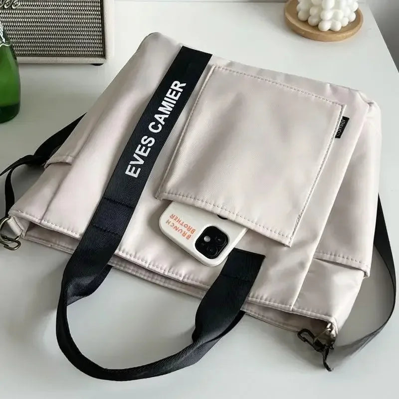 Nuevo bolso de hombro informal de gran capacidad, de nailon, impermeable, de lona, sencillo y moderno, para colegiala.