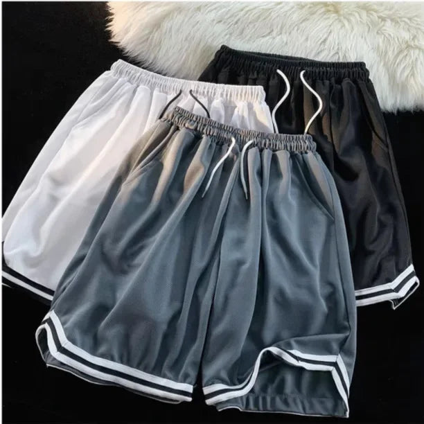 Pantalones cortos de baloncesto holgados para hombre, para correr, playa, verano, estilo americano, deportivos, informales, versátiles, de cinco pulgadas de largo.