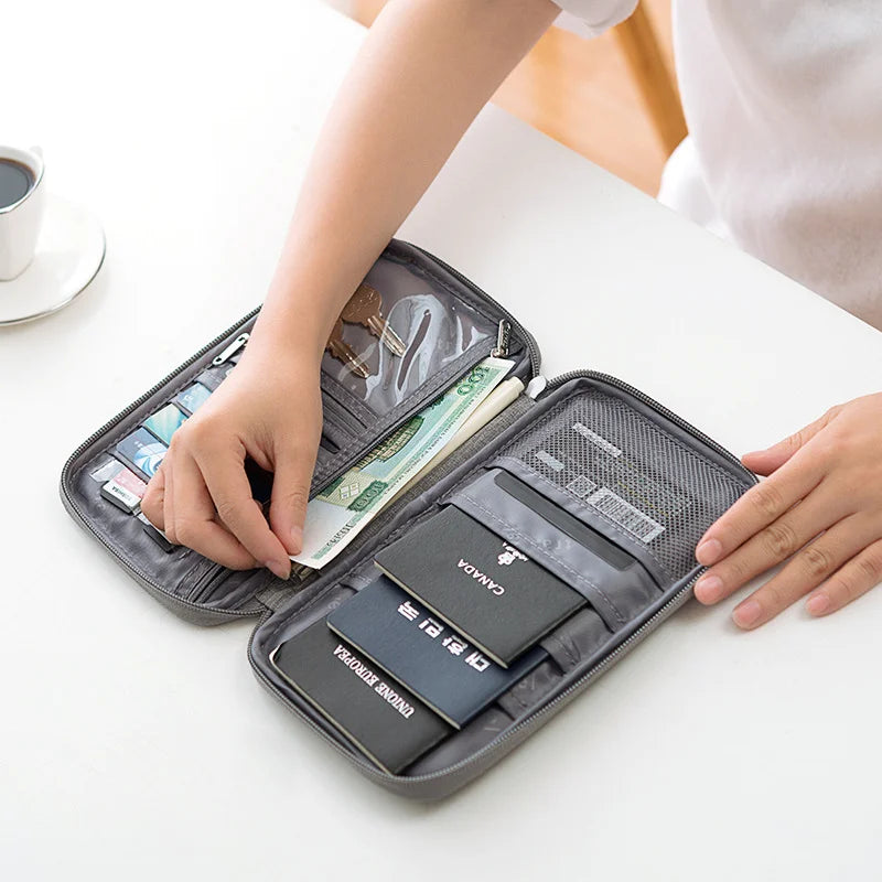 Organizador de documentos de viaje: porta pasaporte impermeable con bloqueo RFID, ranuras para múltiples tarjetas y bolsillo con cremallera para avión/tren.