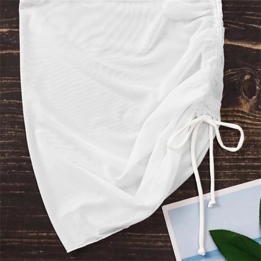 Traje de baño sexy translúcido, falda de playa, falda de gasa para vacaciones en la playa, falda con volantes, falda de malla con cordón ajustable, ropa de playa sólida, falda a la cadera
