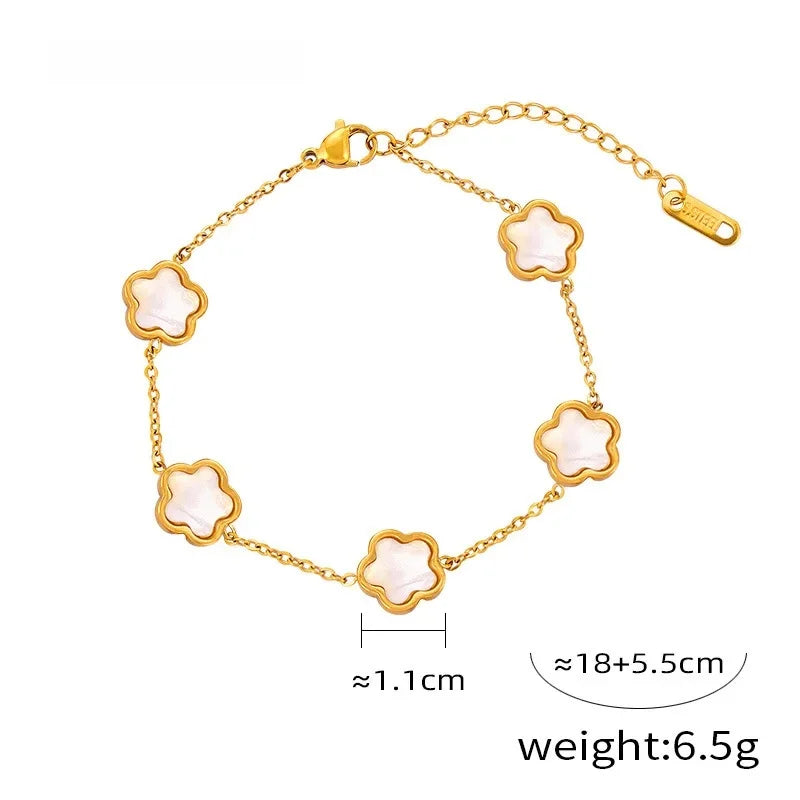 Conjunto de joyería con accesorios rústicos de flores de acero de titanio y concha blanca, pendientes de acrílico y collar sencillo.