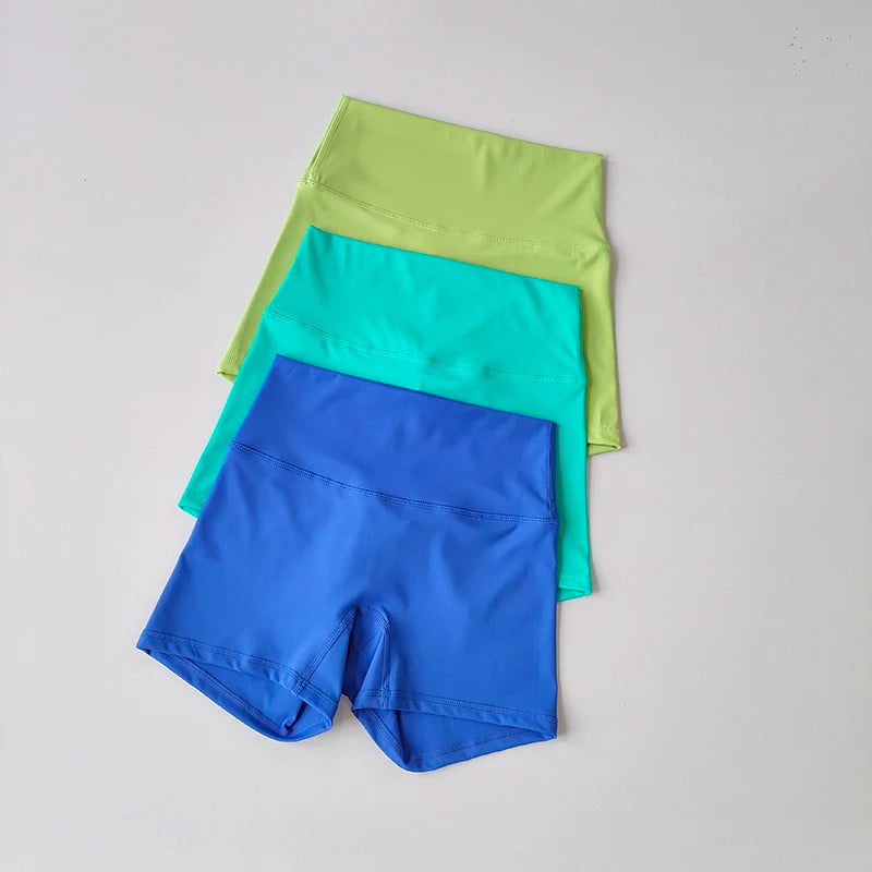 Pantalones cortos deportivos de yoga, ajustados, elásticos, de tres piezas, con cintura alta, realce de cadera y secado rápido.