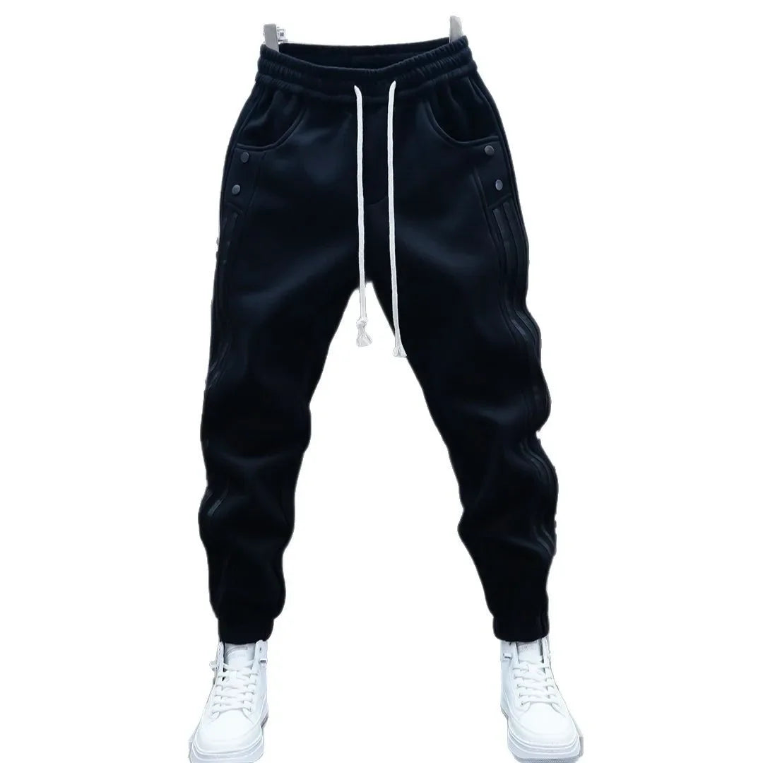 Pantalones casuales de primavera 2025 para hombre, modernos, con cintura elástica y banda, pantalones deportivos versátiles y de moda.