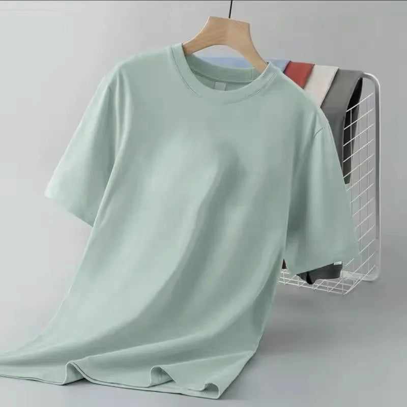 Camiseta de manga corta de color liso para hombre, corte entallado, clásica, versátil, interior, adelgazante, para verano, 2024
