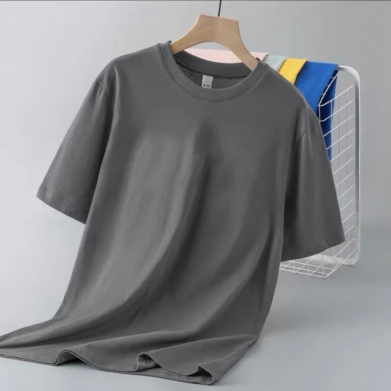Camiseta de manga corta de color liso para hombre, corte entallado, clásica, versátil, interior, adelgazante, para verano, 2024