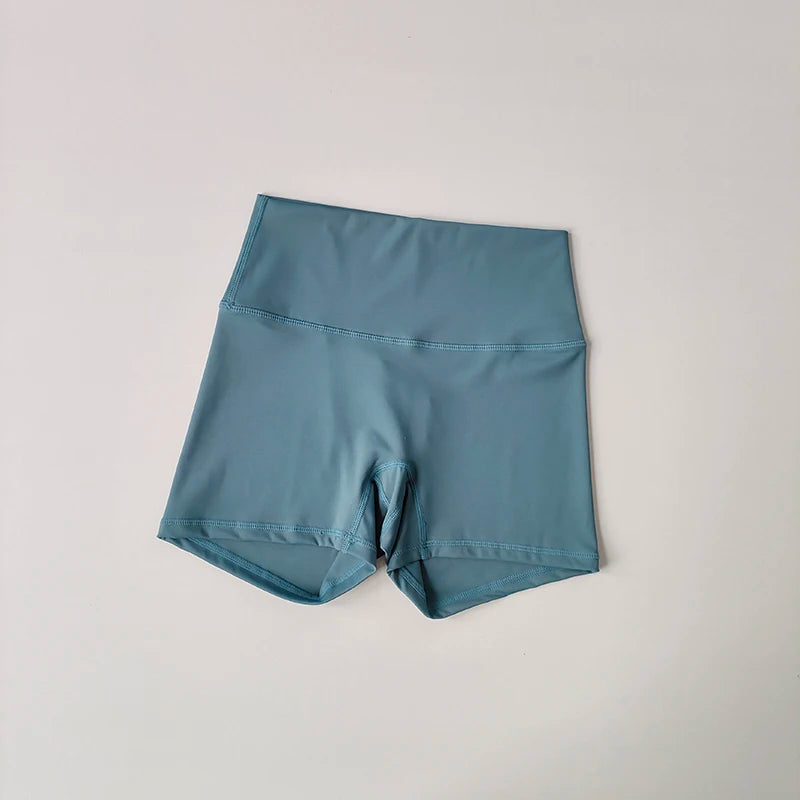 Pantalones cortos deportivos de yoga, ajustados, elásticos, de tres piezas, con cintura alta, realce de cadera y secado rápido.