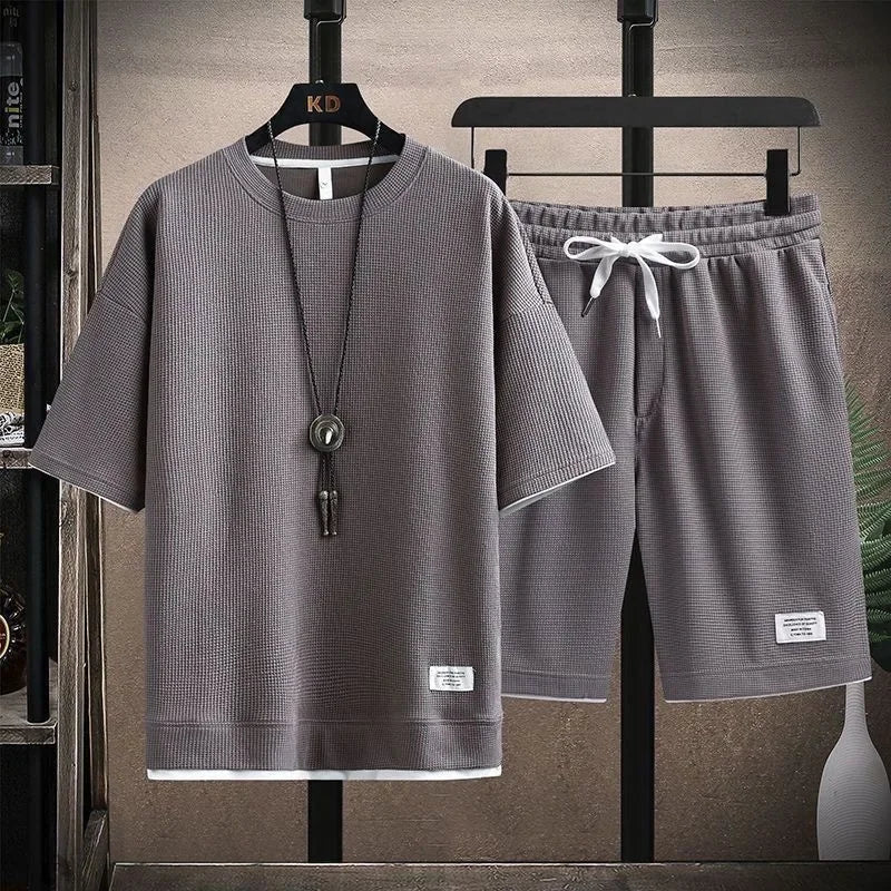 Conjunto deportivo informal de verano para hombre, pantalones cortos de manga corta con cordón, pantalones holgados de cinco cuartos, traje fino de dos piezas para hombre