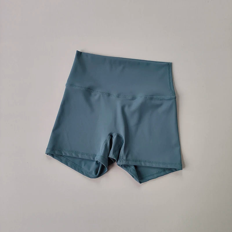 Pantalones cortos deportivos de yoga, ajustados, elásticos, de tres piezas, con cintura alta, realce de cadera y secado rápido.