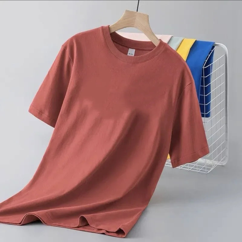 Camiseta de manga corta de color liso para hombre, corte entallado, clásica, versátil, interior, adelgazante, para verano, 2024