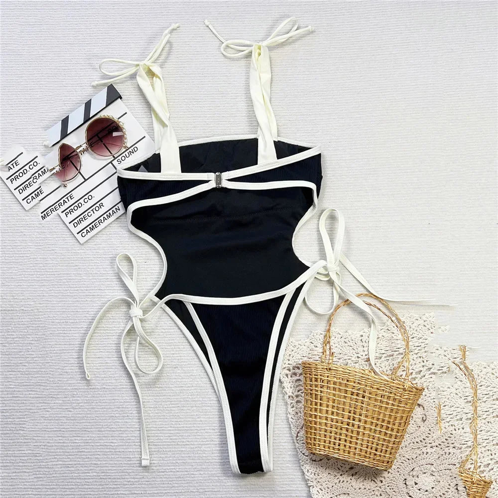 Traje de baño sexy negro sin espalda para mujer 2025, traje de baño de una pieza en contraste blanco y negro, monokini ahuecado con cordones.