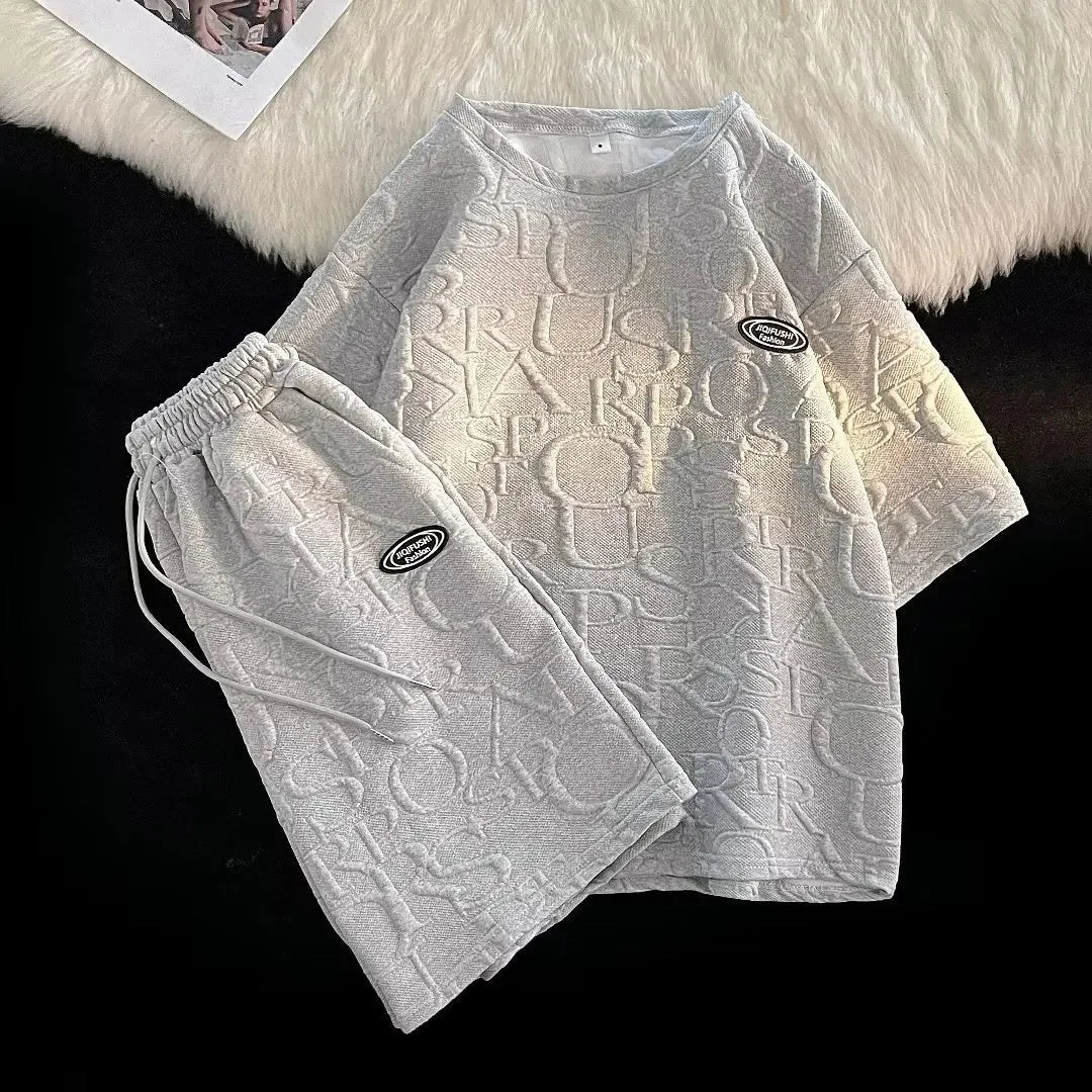 Conjunto de camiseta y pantalones cortos de manga corta para hombre, ropa deportiva informal de verano, corte holgado, marca de moda, largo de cinco cuartos, cómodo
