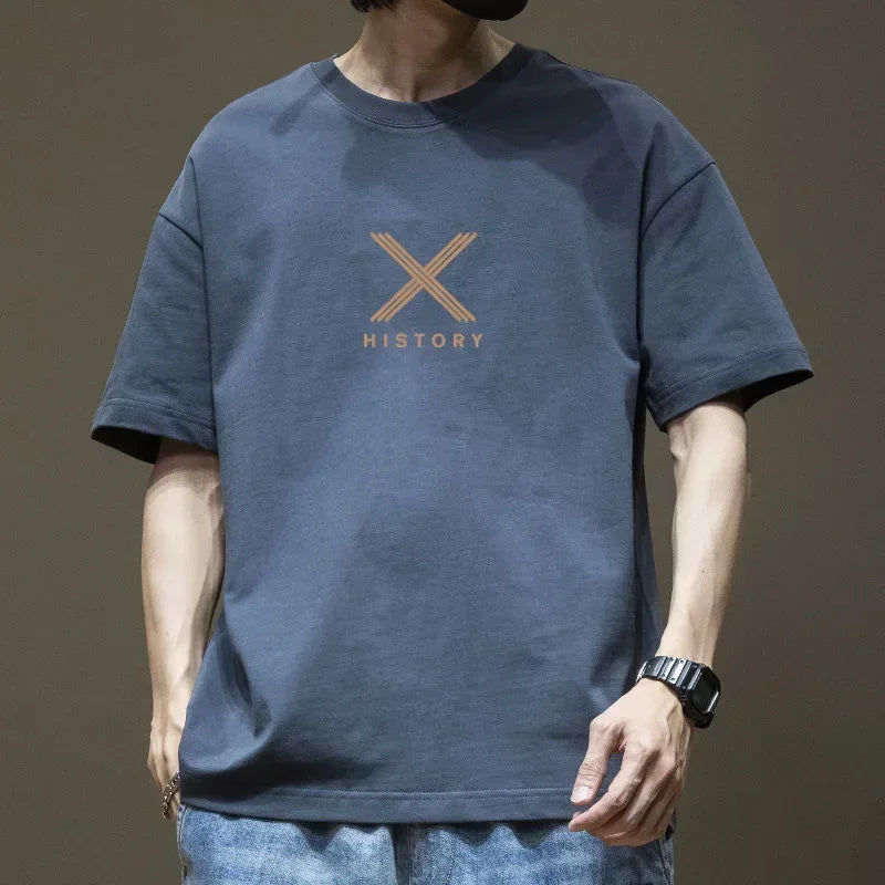 Camiseta de manga corta para hombre tendencia de verano 100% algodón con media manga americana 2025 nueva camiseta casual estilo Hong Kong T