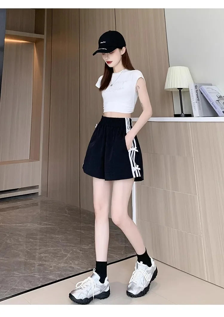 Pantalones cortos deportivos coreanos de Goft con lazo dulce a rayas en blanco y negro, pantalones deportivos de moda de verano, cómodos, transpirables, de secado rápido