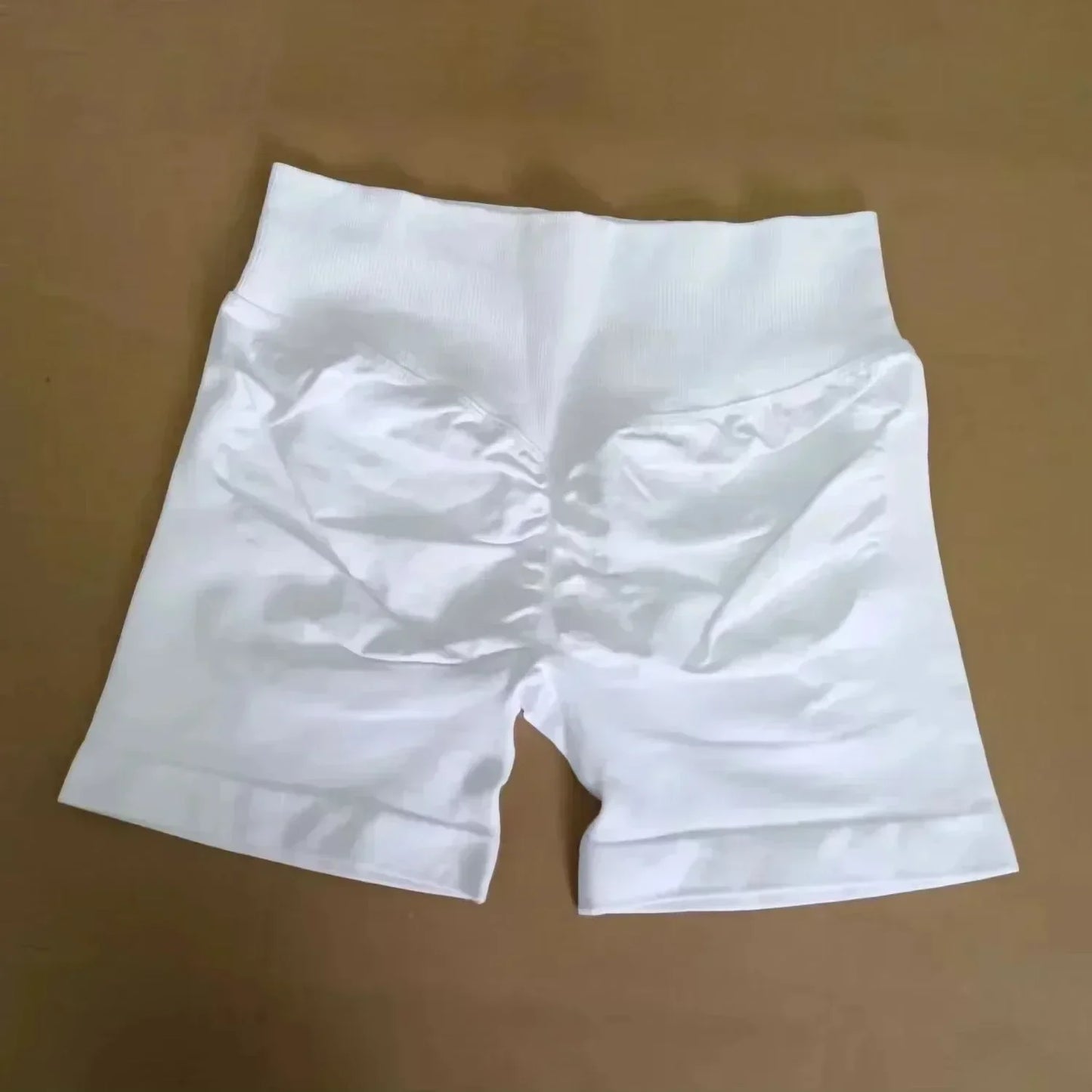 Pantalones cortos deportivos de yoga para mujer, de verano, con efecto piel de melocotón, con bolsillo en la cadera, cintura alta, levantamiento de cadera, secado rápido.