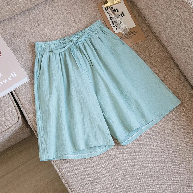 Pantalones cortos de algodón para mujer, informales, de verano, con dos bolsillos, de cintura alta, holgados, suaves y frescos.