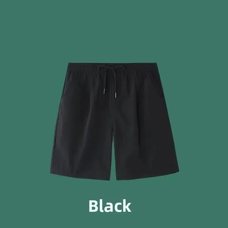 Pantalones vaqueros holgados de pierna recta, elásticos, resistentes al desgaste y versátiles para trabajo y construcción.