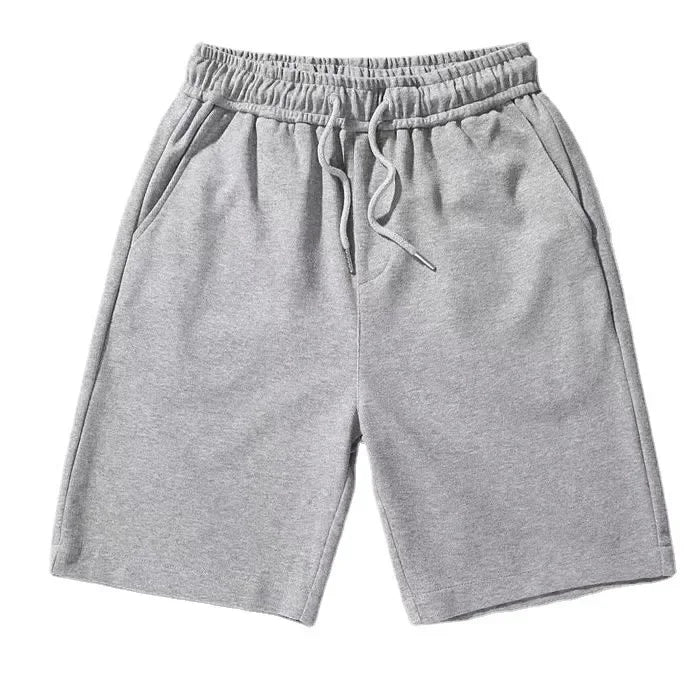 Pantalones cortos deportivos holgados de color puro para hombre y mujer, informales, de verano, con pierna recta, adelgazantes, de cinco cuartos