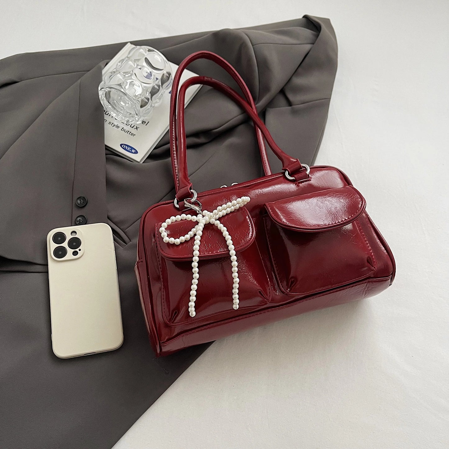 Bolso de hombro con lazo para mujer, edición coreana 2024, moderno y versátil.
