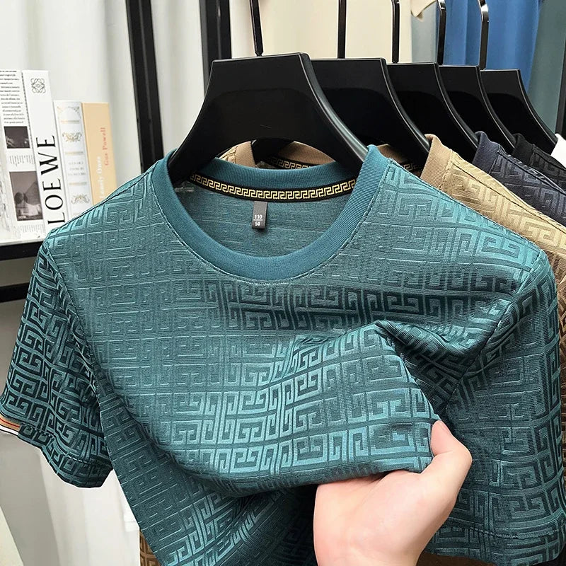 Camiseta de cuello redondo y manga corta de jacquard de moda para hombre, nueva, informal, cómoda y versátil para todas las estaciones, 2025