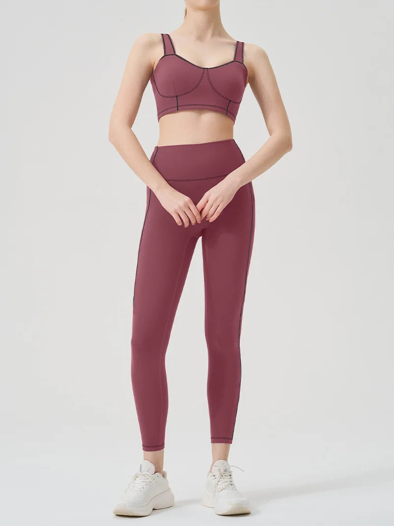 Ropa de yoga, un conjunto deportivo de alta gama, de color sólido, de alta elasticidad, ajustado y de alta intensidad, ropa de fitness para mujer adecuada para el gimnasio.
